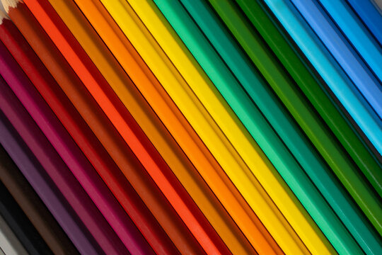 rainbow background from colored stripes, colored bright pencils