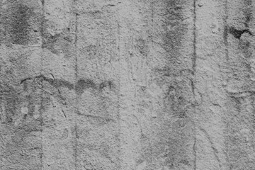 Obraz premium Texture of a concrete wall with cracks and scratches which can be used as a background