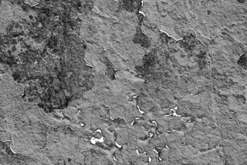 Texture of a concrete wall with cracks and scratches which can be used as a background