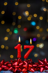 Number 17 Joyful greeting card for birthdays or anniversaries. This image is part of a serie of photos of different numbers burning candles that goes from 1 to 100