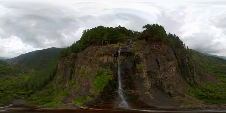 Waterfall in the rainforest, jungle. Aerial drone of Bambarakanda Falls, Sri Lanka. VR 360.