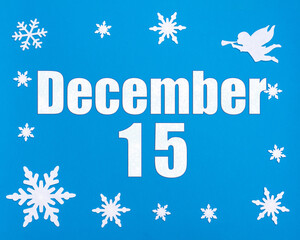 Naklejka na ściany i meble December 15th. Winter blue background with snowflakes, angel and a calendar date. Day 15 of month.