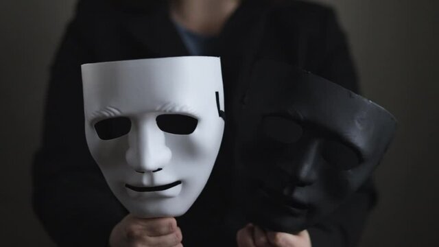 actor with masks at the opera theater plays theatrical play tragic comedy in different roles