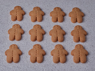 Ginger bread men isolated on a white sparkly background.
