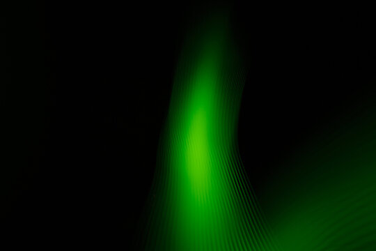 Green blurred light lines. Green abstraction.