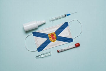 Blood tube for test detection of virus Covid-19 Omicron Variant with positive result, medicine mask...