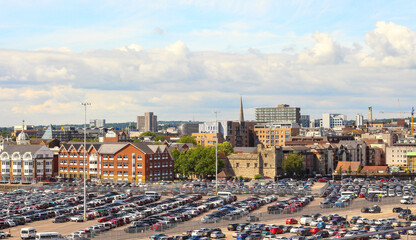 Wide shot overlooking the skyline of Southampton from a ship in the docks, Hampshire, UK.