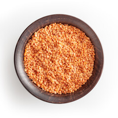 Red lentils in ceramic bowl isolated on white background with cliping path