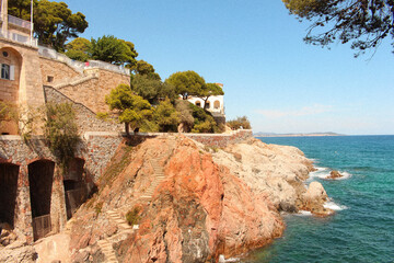 Red rugged rocks and sea of tourist spot, Girona, north of Barcelona, Spain.