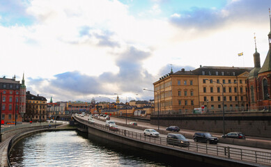 Fototapeta premium Highway of cars running through Gamla Stan, centre of Stockholm, Sweden.