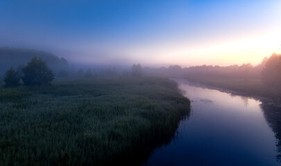 Fototapeta na wymiar morning mist over the river 6K