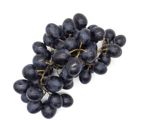 Bunch of black grapes isolated on white background
