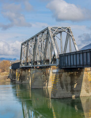 A railway bridge over the a river. Taken in Kamloops, British Columbia