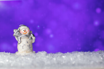 Snowman and standing on snow 