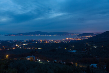 Fototapeta na wymiar View of Volos City with lights at night