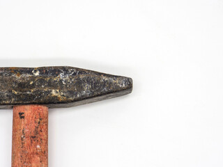 old rusty hammer on white background