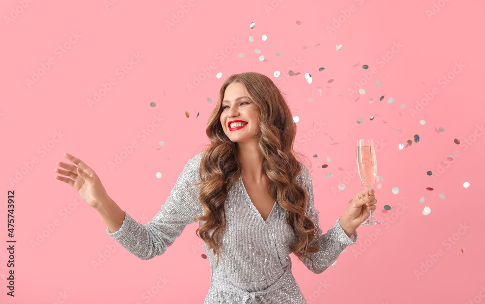 Canvas Prints beautiful happy young woman with champagne and falling confetti on color background