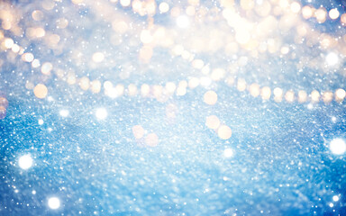 Snow background, glowing winter backdrop with garlands. Christmas lights, nature. White cold waves...