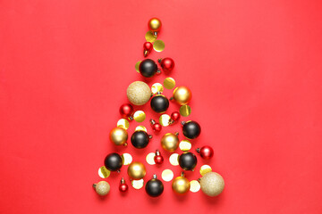 Christmas tree made of decor on red background