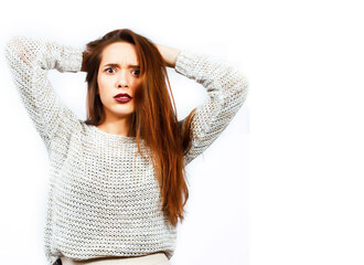 young pretty teenage hipster girl posing emotional happy smiling on white background, lifestyle people concept