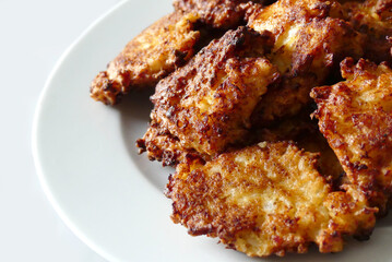 close-up pan fried cauliflower,fried cauliflower on a dinner fork,