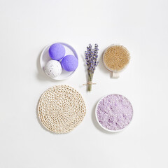 Lavender spa products, bath bomb, sea salt, dry lavender flowers, natural massaging brush for body. Beauty treatment and body care concept, herbal medicine