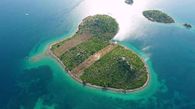 Aerial view of the heart shaped Galesnjak island on the adriatic coast, Zadar, Croatia. Heart shaped island of Galesnjak in Zadar archipelago aerial view, Dalmatia region of Croatia.