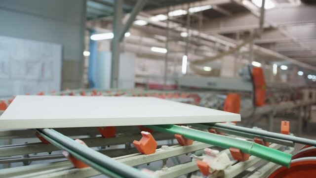 Ceramic Tiles Moving on Conveyer Line in a Factory 