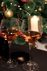 Christmas tree with glasses wine and candles