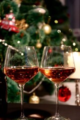 glasses of champagne and christmas tree