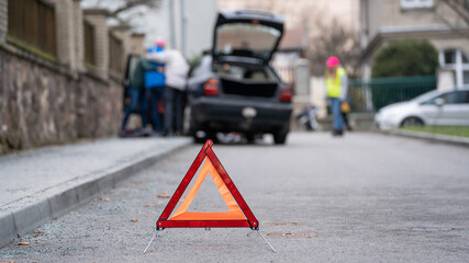 Warning sign on the side of the road