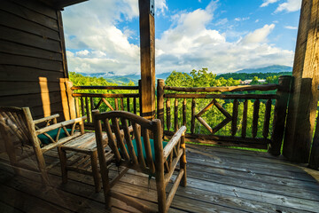 Wooden chair on porch with beautiful view of the Great Smoky Mountains