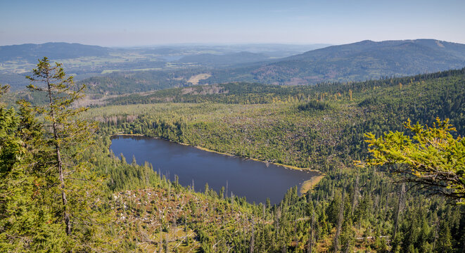 &Scaron;umava glacial lake - on the descent from a mountain ridge
