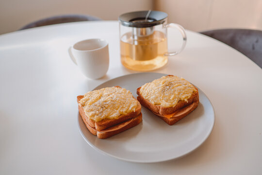 Vertical closeup shot of classic French specialty, croque-monsieur with grilled cheese