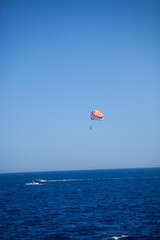 paraglider over the sea