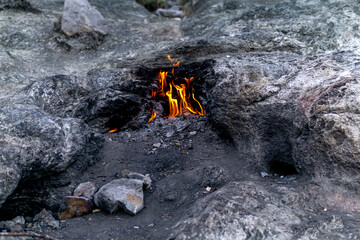 constantly burning fire at the place of a natural gas emission on Mount Chimaera (Yanartas), Turkey