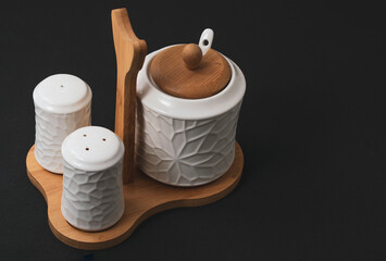 salt and spice set used for kitchen on black background