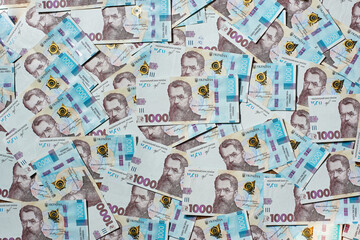 Background from Ukrainian money. Ukrainian 1000. Banknotes of Ukraine. Banner made of bills.