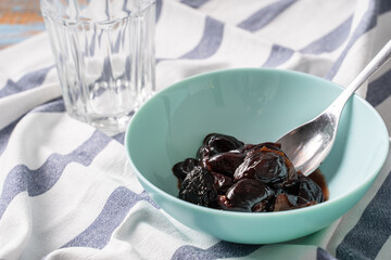 easy stewed prunes cooked dry plum fruit in a bowl on the table