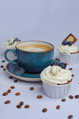 Chocolate cupcakes and coffee on craft paper