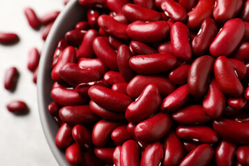Raw red kidney beans in bowl, top view