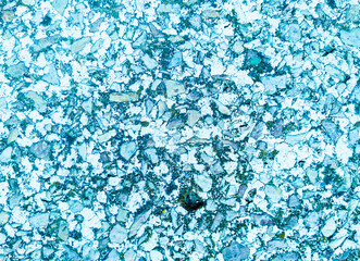 Abstract turquoise, aquamarine and blue background. Chaotic spots and stains. Wallpaper with bright...