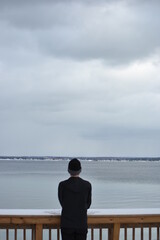 Fototapeta premium person watching the sea