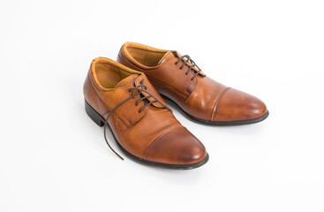 Brown leather mens shoes isolated on white background.