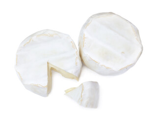 Fototapeta na wymiar Tasty cut and whole brie cheeses on white background, top view