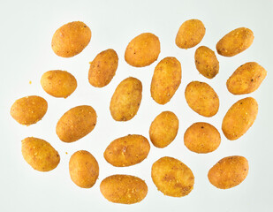 Top View of Crunchy Coated Peanuts on White Background