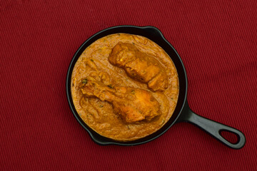 Top View of Butter Chicken Served in Skillet Pan