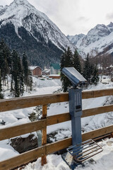 Fototapeta premium Binocular against observation deck view. Binoculars telescope for travelers.
