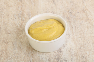 Organic mustard sauce in the bowl