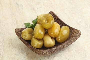 Pickled green tomato in the bowl